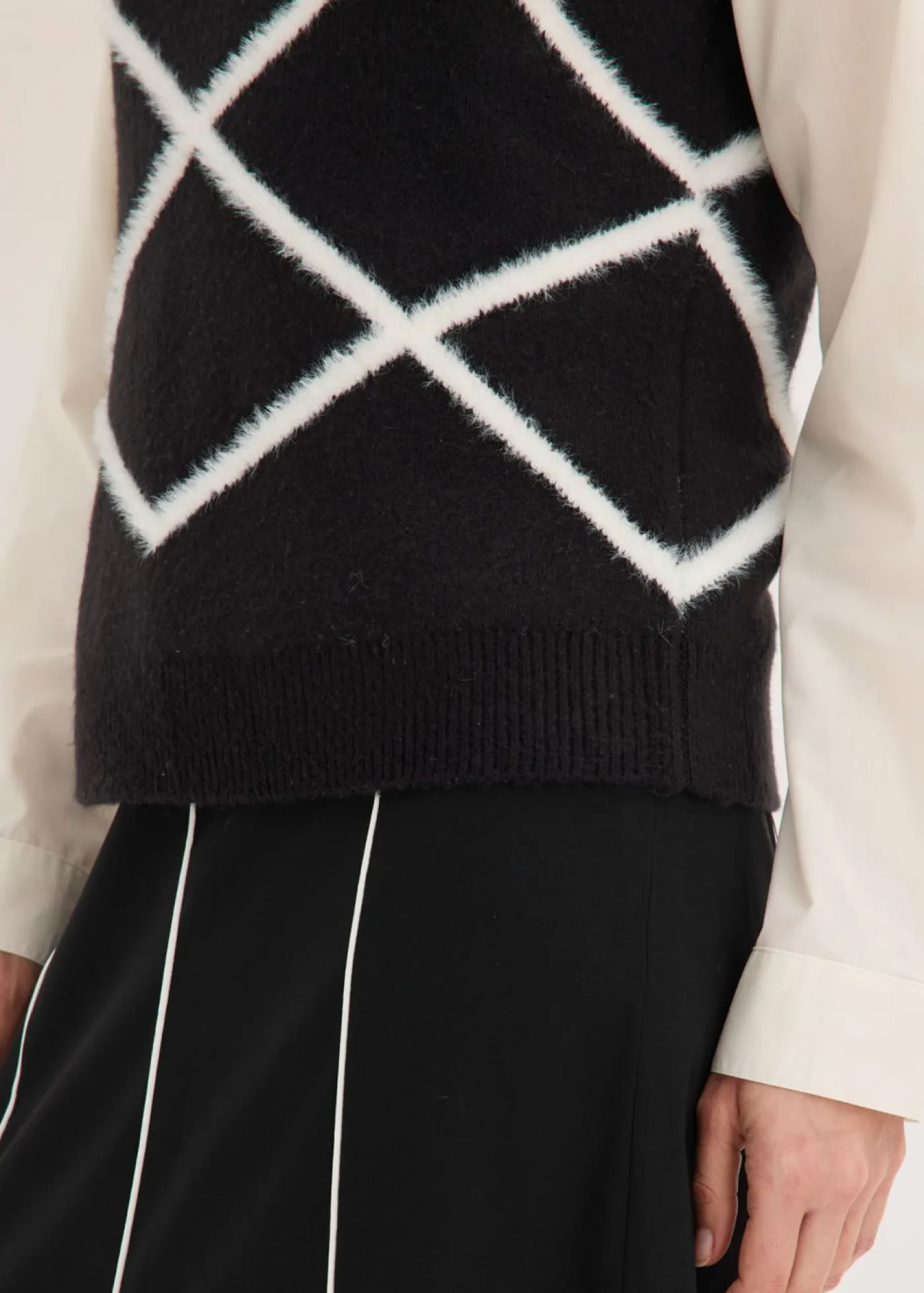 Mujer bonprix bonprix Jersey sin mangas de hilo suave