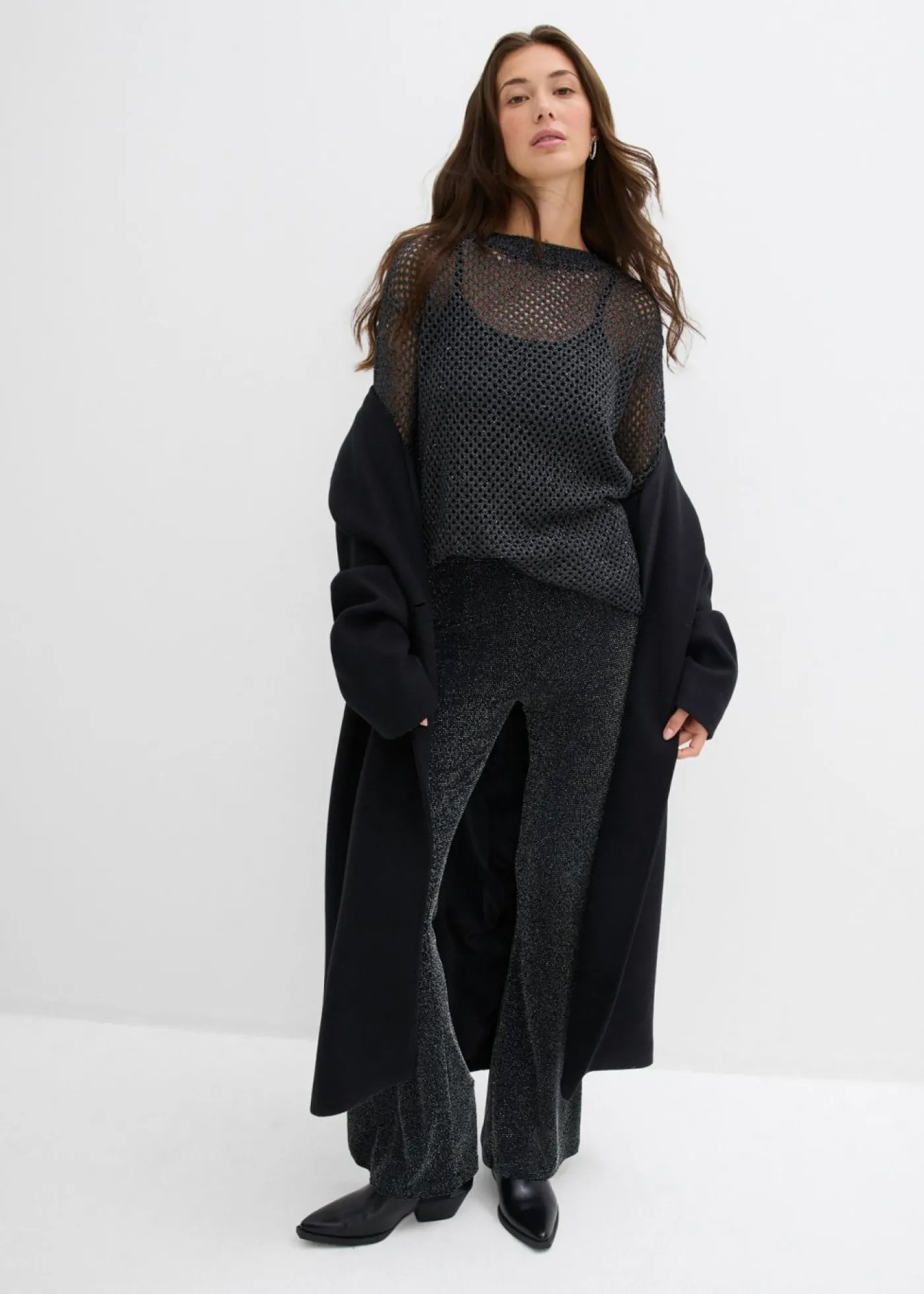 bonprix bonprix Pantalones>Leggings acampanados con purpurina Negro