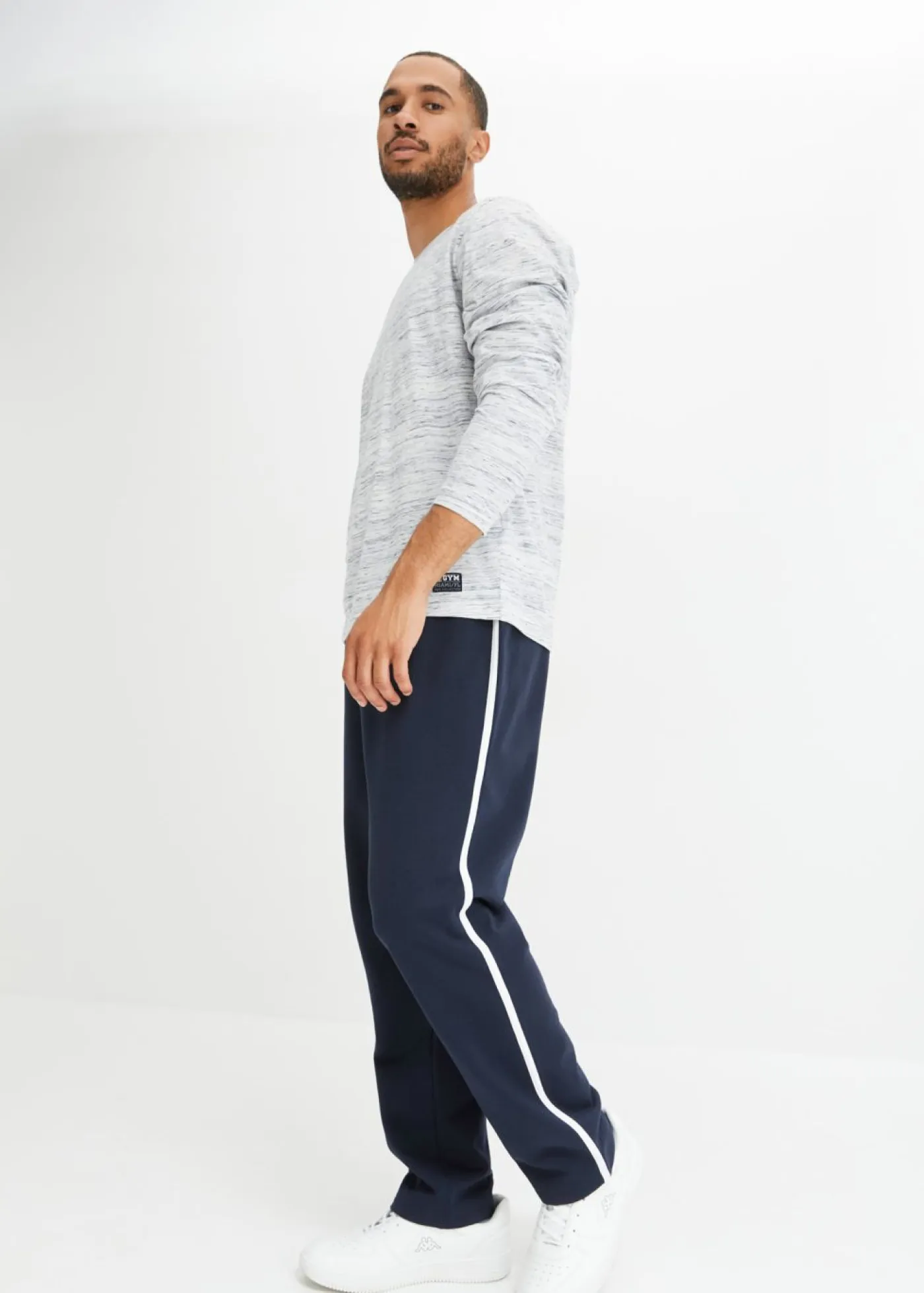 Hombre bonprix bonprix Pantalón de chándal loose fit con detalles en contraste (2 unidades)