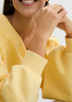 Mujer bonprix bonprix Sudadera ancha con un hombro al descubierto