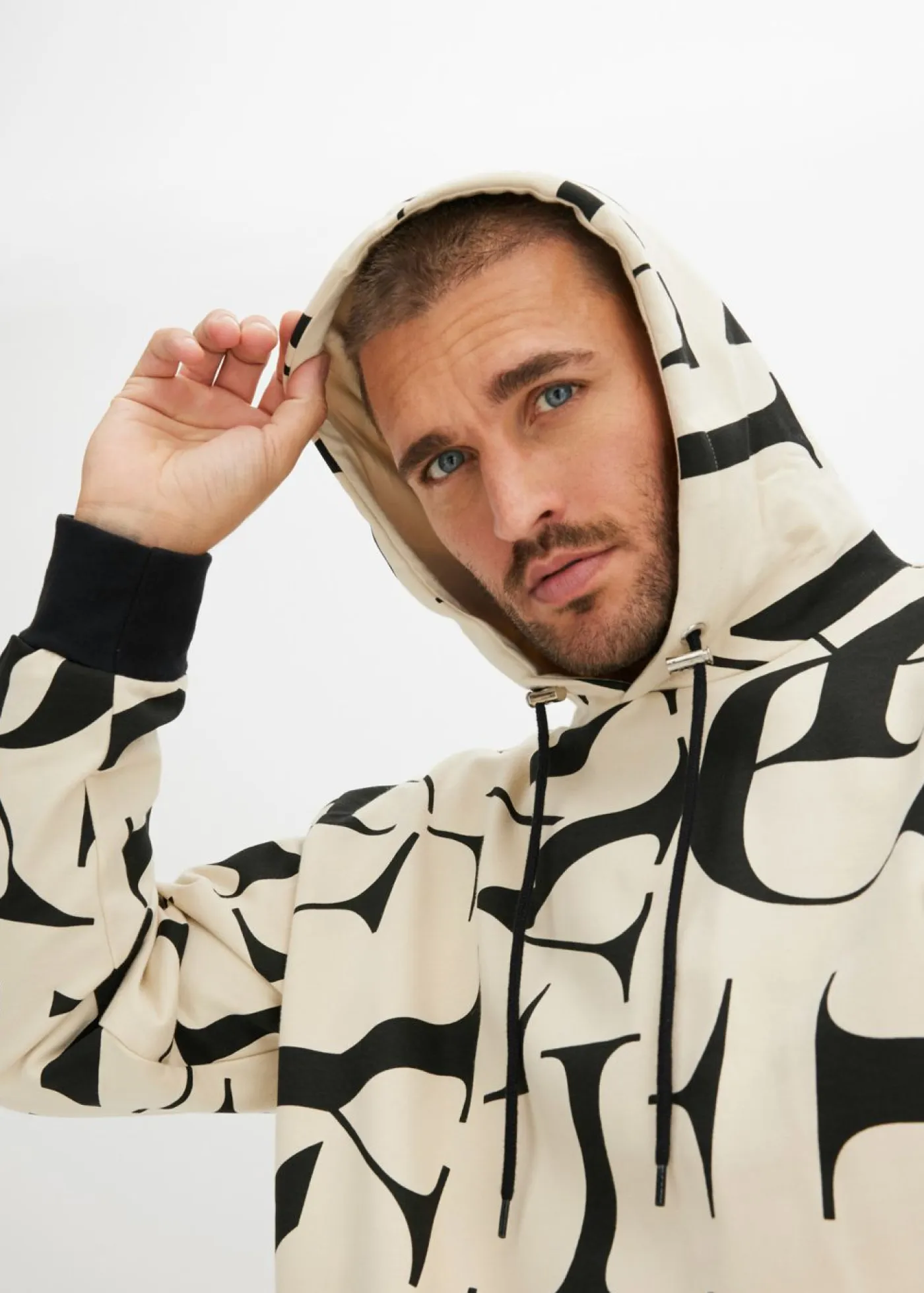 bonprix bonprix Chándals>Sudadera de algodón orgánico con corte holgado y capucha Arena claro-negro