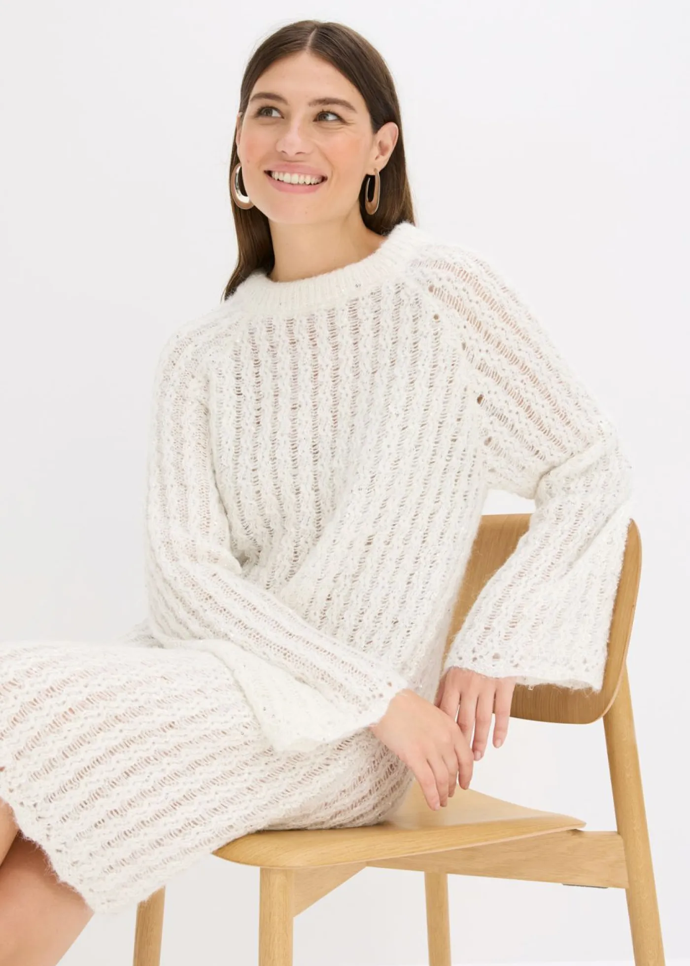 Mujer bonprix bonprix Vestido corto de punto con lazo de satén y ligeras transparencias